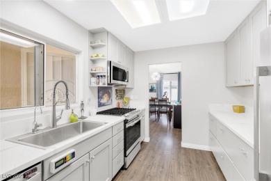 Discover this stunning, move-in ready 2-bed, 2-bath townhome on Highland Falls Golf Club in Nevada - for sale on GolfHomes.com, golf home, golf lot