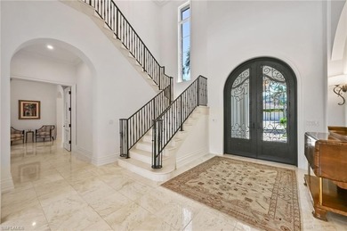 Nestled behind the private gates of Bay Colony Shores, this on Club at Pelican Bay Golf Course in Florida - for sale on GolfHomes.com, golf home, golf lot