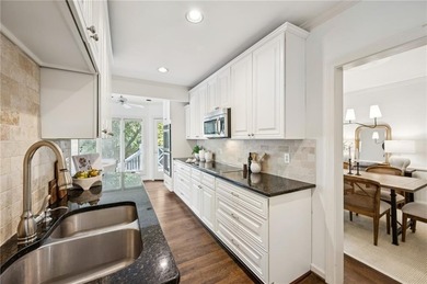 Come live in the heart of beloved Collier Hills in South on Bobby Jones Golf Club in Georgia - for sale on GolfHomes.com, golf home, golf lot