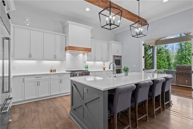 Welcome to 590 Ridgewater Drive, where thoughtful design on Indian Hills Country Club in Georgia - for sale on GolfHomes.com, golf home, golf lot