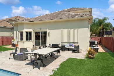 Large Pool and Patio to play in. Big fenced backyard is perfect on Keys Gate Golf Club in Florida - for sale on GolfHomes.com, golf home, golf lot