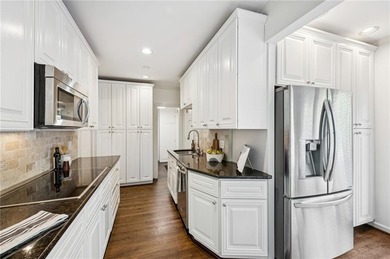 Come live in the heart of beloved Collier Hills in South on Bobby Jones Golf Club in Georgia - for sale on GolfHomes.com, golf home, golf lot