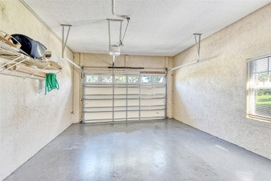 WELCOME HOME to your 2-bedroom, 2-bathroom condominium located on Palm Aire Country Club of Sarasota in Florida - for sale on GolfHomes.com, golf home, golf lot
