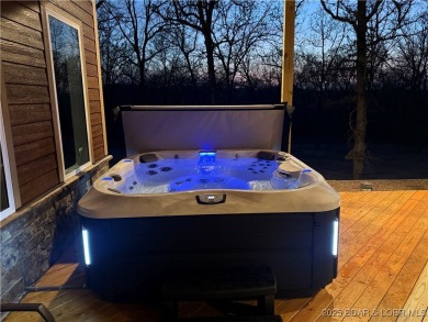 Experience unparalleled luxury living at The Estates of on The Club At Old Kinderhook in Missouri - for sale on GolfHomes.com, golf home, golf lot