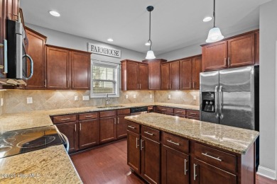 Welcome to 113 Whisper Grove Court--a spacious and beautifully on Whispering Pines Golf Course in North Carolina - for sale on GolfHomes.com, golf home, golf lot