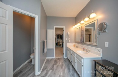 Wonderfully renovated home located on a private, wooded lot on on The Tradition Golf Club in North Carolina - for sale on GolfHomes.com, golf home, golf lot