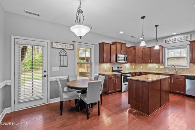 Welcome to 113 Whisper Grove Court--a spacious and beautifully on Whispering Pines Golf Course in North Carolina - for sale on GolfHomes.com, golf home, golf lot