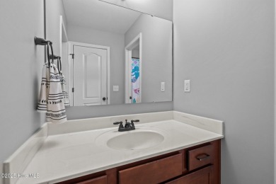 Welcome to 113 Whisper Grove Court--a spacious and beautifully on Whispering Pines Golf Course in North Carolina - for sale on GolfHomes.com, golf home, golf lot