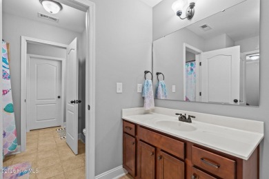 Welcome to 113 Whisper Grove Court--a spacious and beautifully on Whispering Pines Golf Course in North Carolina - for sale on GolfHomes.com, golf home, golf lot