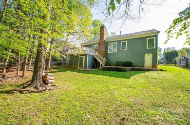 Wonderfully renovated home located on a private, wooded lot on on The Tradition Golf Club in North Carolina - for sale on GolfHomes.com, golf home, golf lot