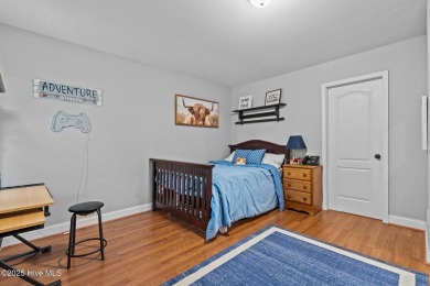 Welcome to 113 Whisper Grove Court--a spacious and beautifully on Whispering Pines Golf Course in North Carolina - for sale on GolfHomes.com, golf home, golf lot