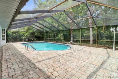 Majestic oak trees and sago palms welcome you to this beautiful on Sugarmill Woods Golf and Country Club in Florida - for sale on GolfHomes.com, golf home, golf lot
