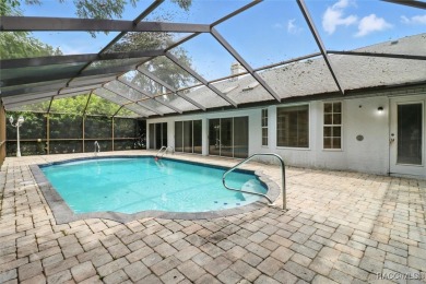 Majestic oak trees and sago palms welcome you to this beautiful on Sugarmill Woods Golf and Country Club in Florida - for sale on GolfHomes.com, golf home, golf lot