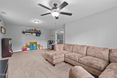 Welcome to 113 Whisper Grove Court--a spacious and beautifully on Whispering Pines Golf Course in North Carolina - for sale on GolfHomes.com, golf home, golf lot