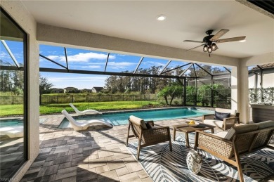 Discover luxury living within the serene coastal modern ambiance on Old Corkscrew Golf Club in Florida - for sale on GolfHomes.com, golf home, golf lot