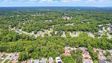Majestic oak trees and sago palms welcome you to this beautiful on Sugarmill Woods Golf and Country Club in Florida - for sale on GolfHomes.com, golf home, golf lot
