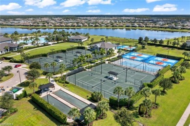 Discover luxury living within the serene coastal modern ambiance on Old Corkscrew Golf Club in Florida - for sale on GolfHomes.com, golf home, golf lot