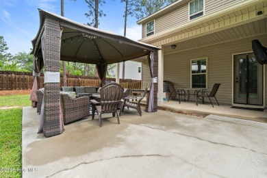 Welcome to 113 Whisper Grove Court--a spacious and beautifully on Whispering Pines Golf Course in North Carolina - for sale on GolfHomes.com, golf home, golf lot