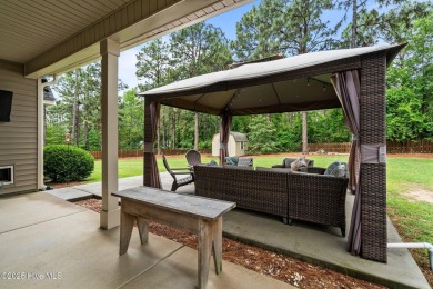 Welcome to 113 Whisper Grove Court--a spacious and beautifully on Whispering Pines Golf Course in North Carolina - for sale on GolfHomes.com, golf home, golf lot