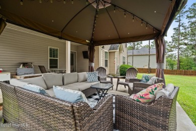 Welcome to 113 Whisper Grove Court--a spacious and beautifully on Whispering Pines Golf Course in North Carolina - for sale on GolfHomes.com, golf home, golf lot