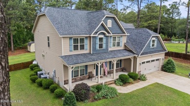 Welcome to 113 Whisper Grove Court--a spacious and beautifully on Whispering Pines Golf Course in North Carolina - for sale on GolfHomes.com, golf home, golf lot
