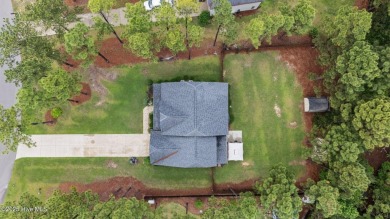 Welcome to 113 Whisper Grove Court--a spacious and beautifully on Whispering Pines Golf Course in North Carolina - for sale on GolfHomes.com, golf home, golf lot