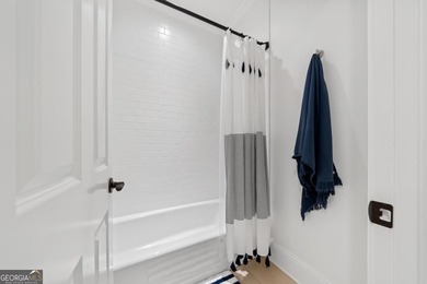 Step into refined elegance and effortless comfort with this on Reynolds Lake Oconee - The Oconee in Georgia - for sale on GolfHomes.com, golf home, golf lot