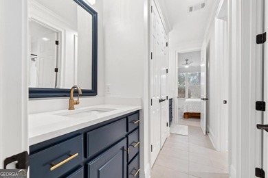 Step into refined elegance and effortless comfort with this on Reynolds Lake Oconee - The Oconee in Georgia - for sale on GolfHomes.com, golf home, golf lot