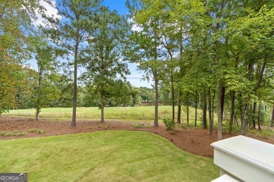 Step into refined elegance and effortless comfort with this on Reynolds Lake Oconee - The Oconee in Georgia - for sale on GolfHomes.com, golf home, golf lot