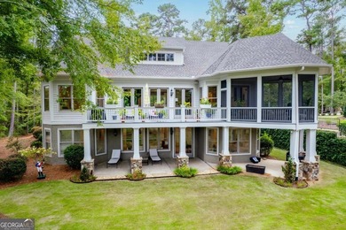 Step into refined elegance and effortless comfort with this on Reynolds Lake Oconee - The Oconee in Georgia - for sale on GolfHomes.com, golf home, golf lot