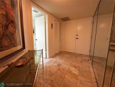 Welcome to this stunning 7th-floor condo in Environ Tower II on Inverrary Country Club in Florida - for sale on GolfHomes.com, golf home, golf lot