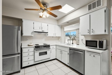 Updated and move-in ready! This 2 bed, 2 bath patio home in Sun on Sun City Lakes West and East in Arizona - for sale on GolfHomes.com, golf home, golf lot