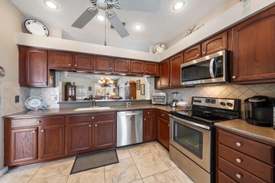 Stunning Pool Home on Premium Pond-View Lot in Gated Golf on Crescent Oaks Country Club in Florida - for sale on GolfHomes.com, golf home, golf lot