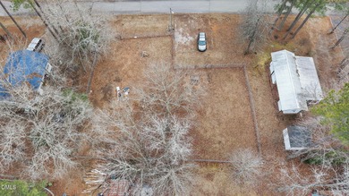 The Ultimate Getaway at Lake Royale! Come visit this lake and on River Golf and Country Club at Lake Royale in North Carolina - for sale on GolfHomes.com, golf home, golf lot