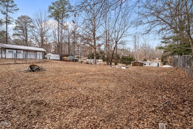 The Ultimate Getaway at Lake Royale! Come visit this lake and on River Golf and Country Club at Lake Royale in North Carolina - for sale on GolfHomes.com, golf home, golf lot