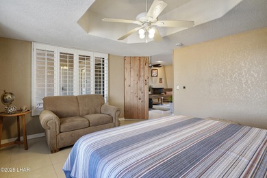 Welcome to your Havasu getaway-where lake views, golf course on London Bridge Golf Course in Arizona - for sale on GolfHomes.com, golf home, golf lot