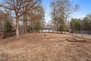 The Ultimate Getaway at Lake Royale! Come visit this lake and on River Golf and Country Club at Lake Royale in North Carolina - for sale on GolfHomes.com, golf home, golf lot