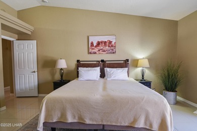 Welcome to your Havasu getaway-where lake views, golf course on London Bridge Golf Course in Arizona - for sale on GolfHomes.com, golf home, golf lot