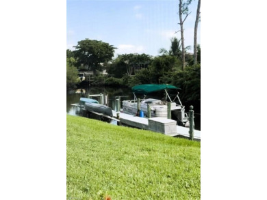 Nestled along the scenic Caloosahatchee River in the Riverbend on Riverbend Golf and Country Club in Florida - for sale on GolfHomes.com, golf home, golf lot