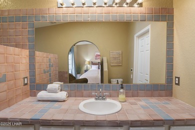 Welcome to your Havasu getaway-where lake views, golf course on London Bridge Golf Course in Arizona - for sale on GolfHomes.com, golf home, golf lot