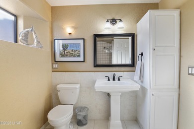 Welcome to your Havasu getaway-where lake views, golf course on London Bridge Golf Course in Arizona - for sale on GolfHomes.com, golf home, golf lot