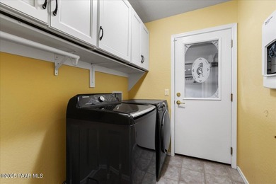 Tucked within a private gated enclave of the prestigious on Prescott Lakes Golf and Country Club in Arizona - for sale on GolfHomes.com, golf home, golf lot