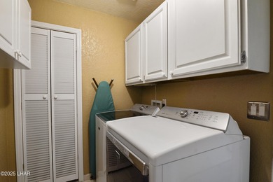 Welcome to your Havasu getaway-where lake views, golf course on London Bridge Golf Course in Arizona - for sale on GolfHomes.com, golf home, golf lot