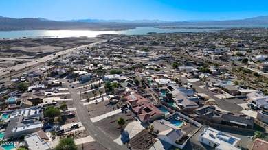 Welcome to your Havasu getaway-where lake views, golf course on London Bridge Golf Course in Arizona - for sale on GolfHomes.com, golf home, golf lot