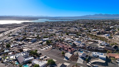 Welcome to your Havasu getaway-where lake views, golf course on London Bridge Golf Course in Arizona - for sale on GolfHomes.com, golf home, golf lot