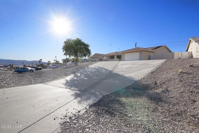 Welcome to your Havasu getaway-where lake views, golf course on London Bridge Golf Course in Arizona - for sale on GolfHomes.com, golf home, golf lot