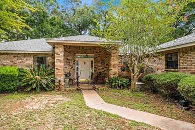 Welcome to this all-brick beauty in the sought-after Tanglewood on Tanglewood Golf Club in Florida - for sale on GolfHomes.com, golf home, golf lot