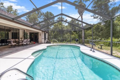 Welcome to this spacious 3-bedroom, 2-bath pool home with nearly on Sugarmill Woods Golf and Country Club in Florida - for sale on GolfHomes.com, golf home, golf lot