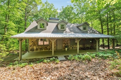 The cozy North Georgia cabin you've been searching for is here on Big Canoe Golf Club - Cherokee in Georgia - for sale on GolfHomes.com, golf home, golf lot