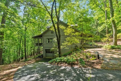The cozy North Georgia cabin you've been searching for is here on Big Canoe Golf Club - Cherokee in Georgia - for sale on GolfHomes.com, golf home, golf lot